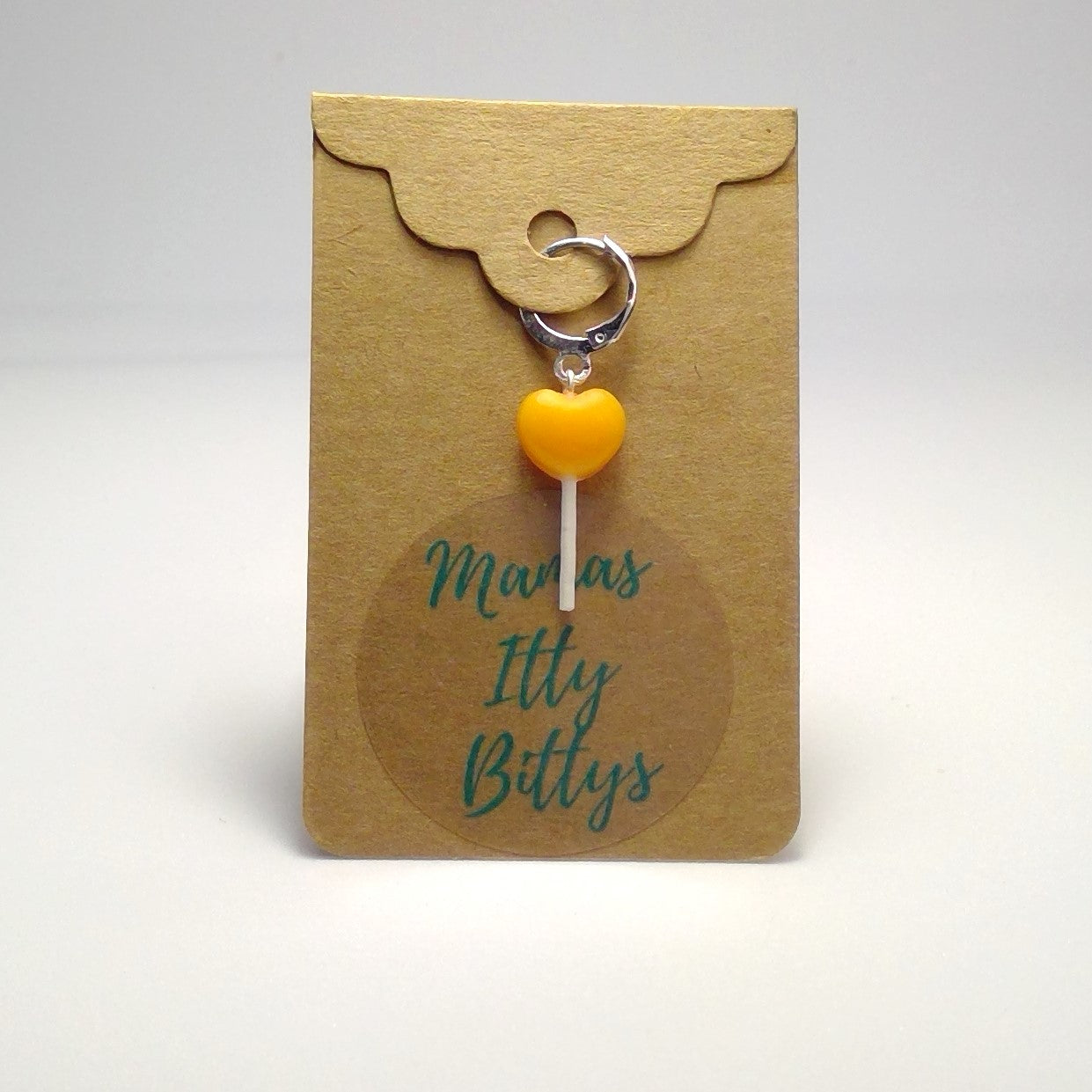 Heart lollipop stitch marker (orange)